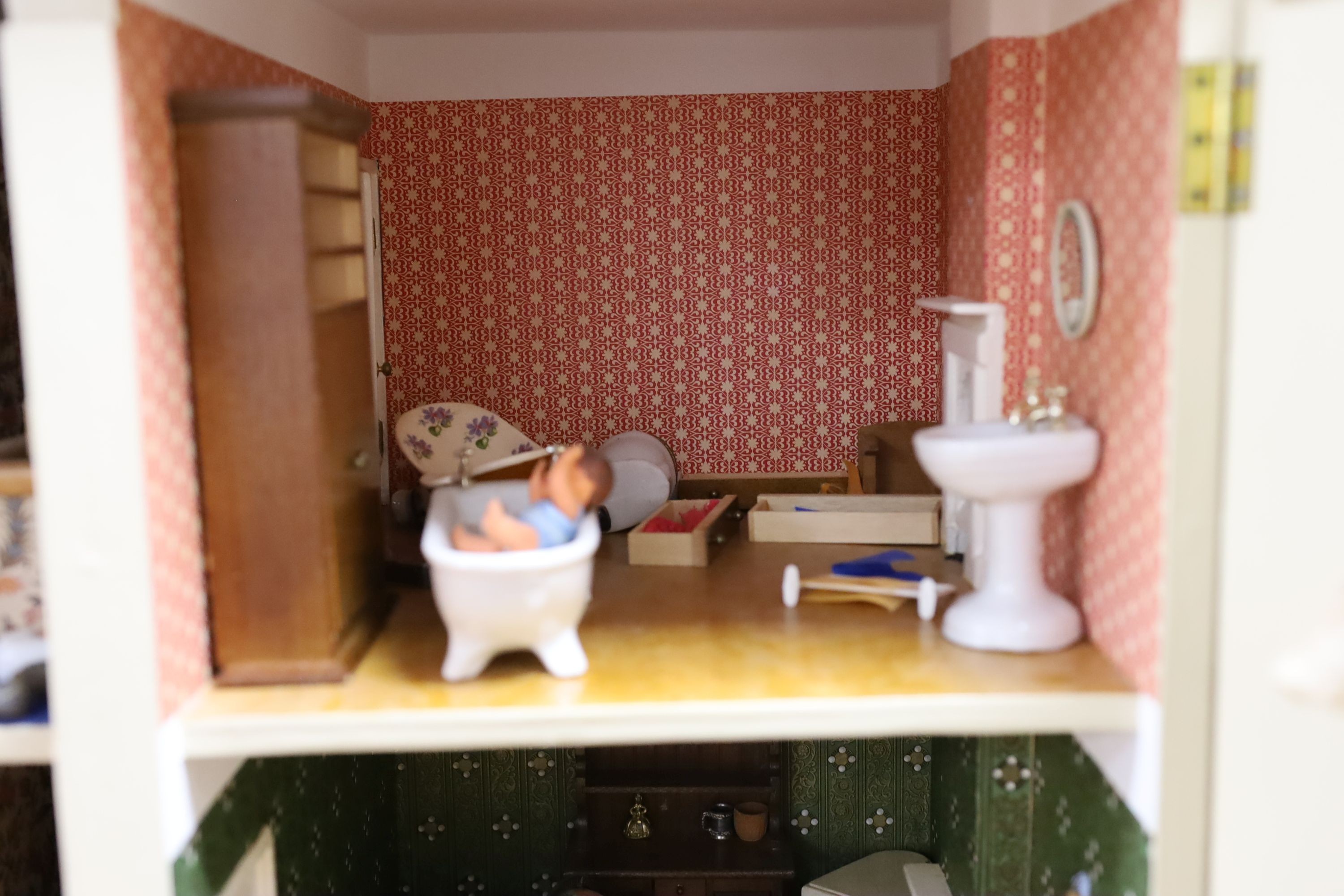 A dolls house, length 74cm, depth 39cm, height 66cm